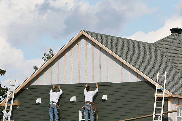 Professional Siding technician working in West Jefferson, OH